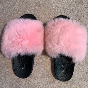 Light pink furry slides